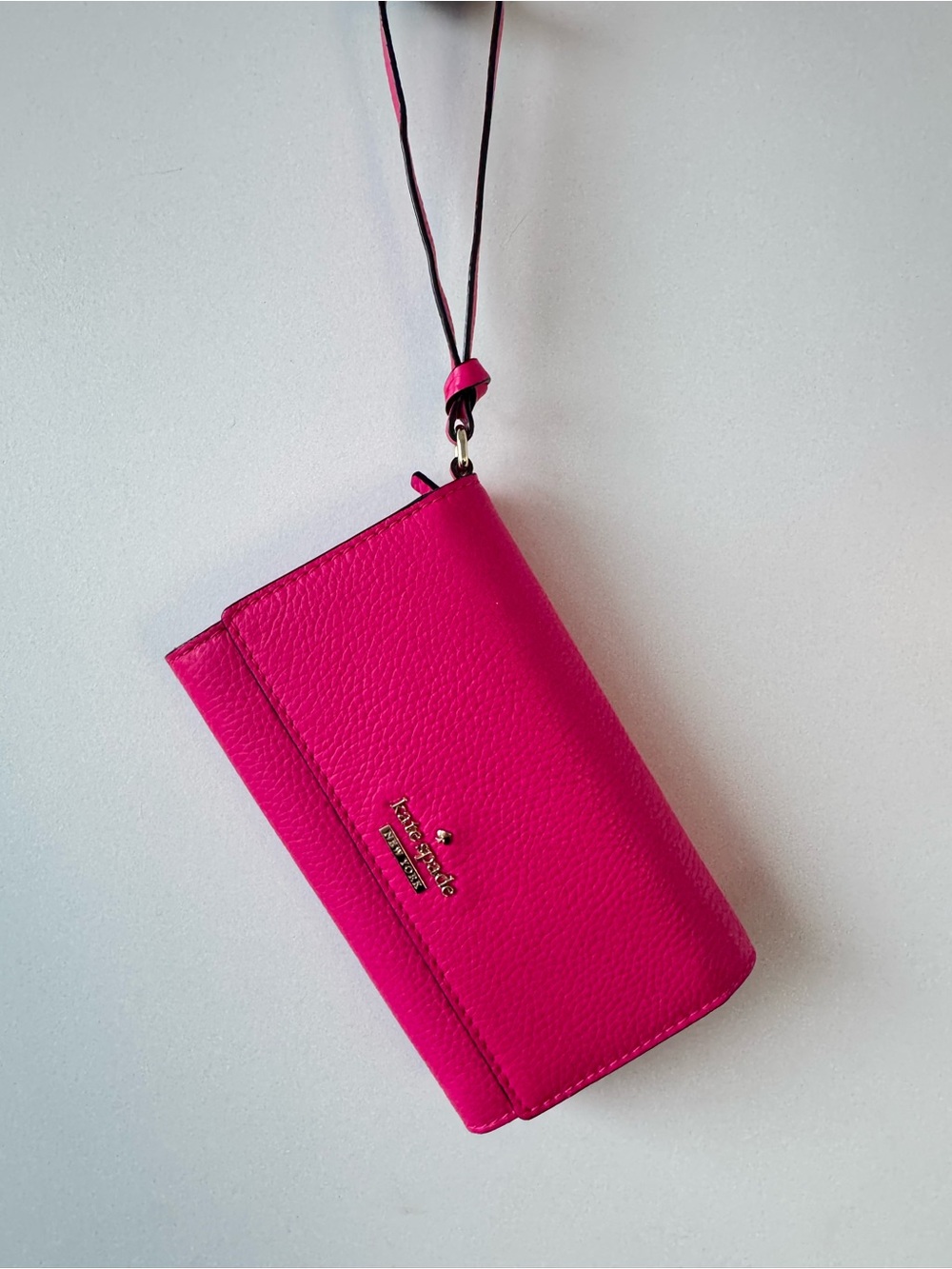 kate spade hot pink leather wristlet with strap